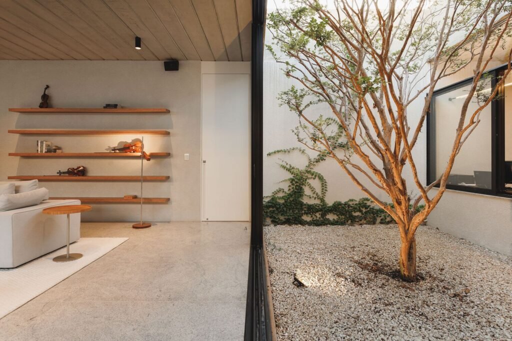 Casa Q U A D R O S / gruta.arquitetos