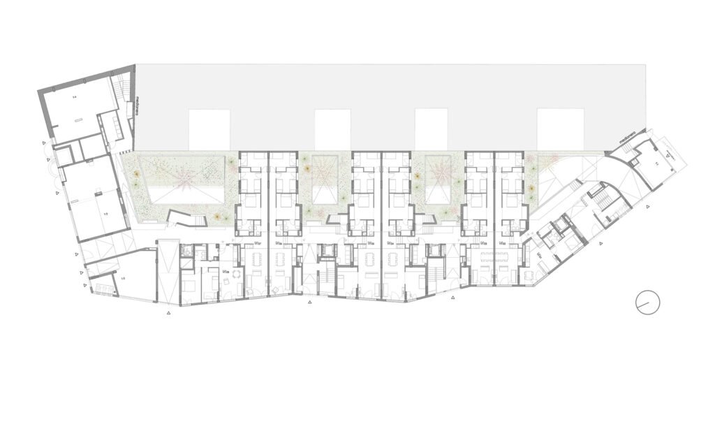 Edificio SFJ6 / MARMOLBRAVO + MADhel