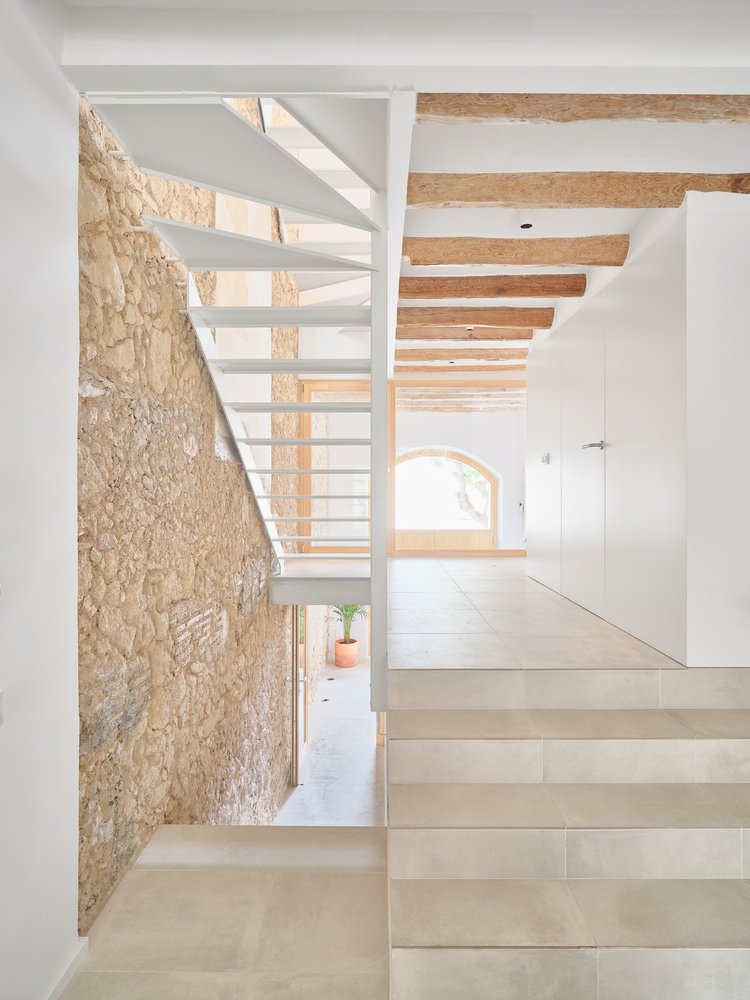 Casa de Pipu y Marta / Menhir Arquitectura