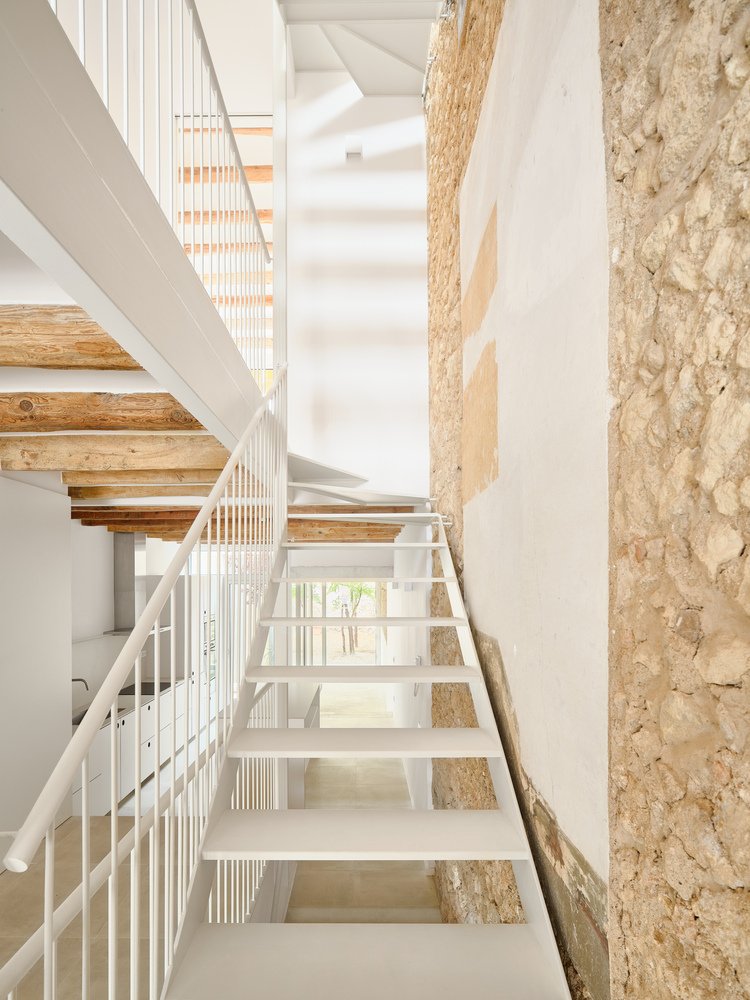 Casa de Pipu y Marta / Menhir Arquitectura