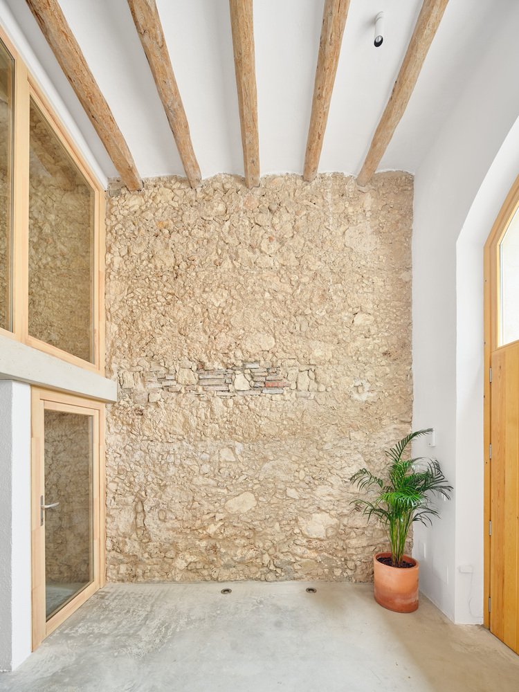 Casa de Pipu y Marta / Menhir Arquitectura