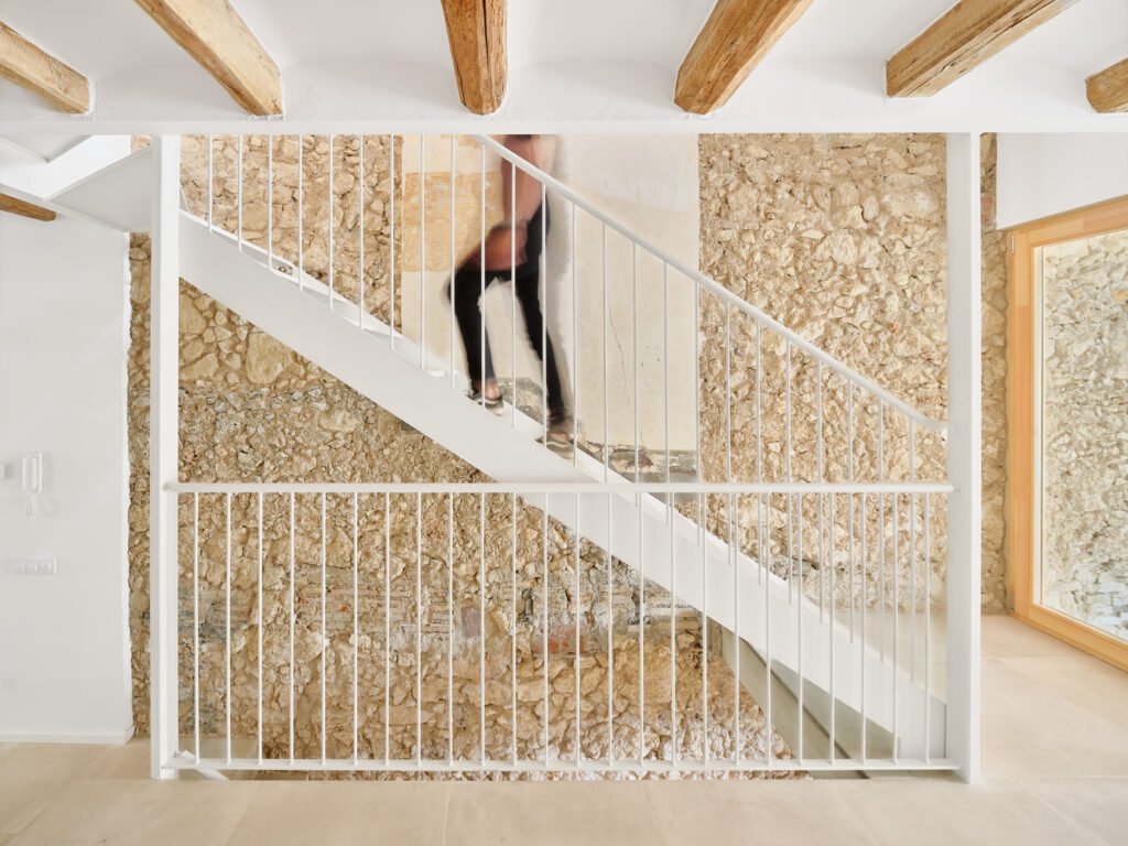 Casa de Pipu y Marta / Menhir Arquitectura