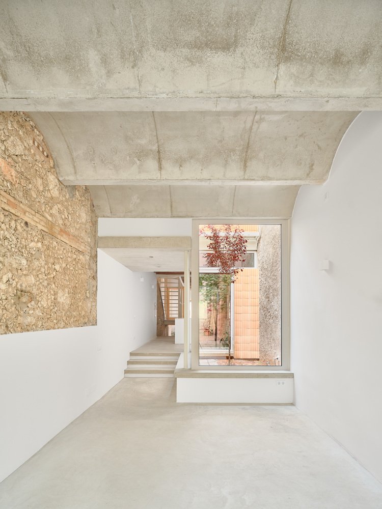 Casa de Pipu y Marta / Menhir Arquitectura