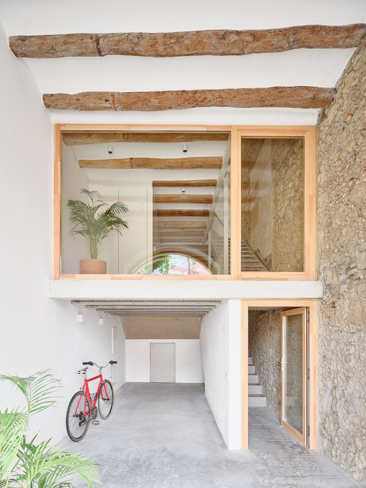 Casa de Pipu y Marta / Menhir Arquitectura
