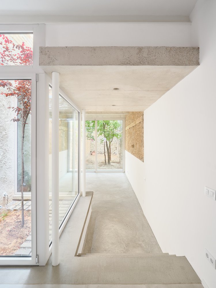 Casa de Pipu y Marta / Menhir Arquitectura